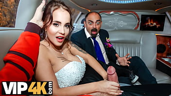 A lucky stranger gets to enjoy a luxurious limousine ride with a stunning bride