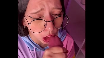 Young brunette teen with glasses gives a handjob and blowjob after classes